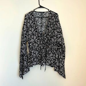 COPY - Nasty Gal floral blouse with a cinch in the front.